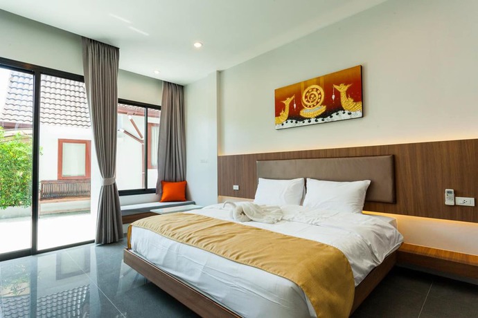 Imagen de la habitación del Hotel Nitchanan Villa. Foto 6