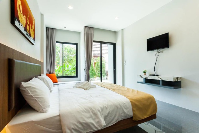 Imagen de la habitación del Hotel Nitchanan Villa. Foto 7