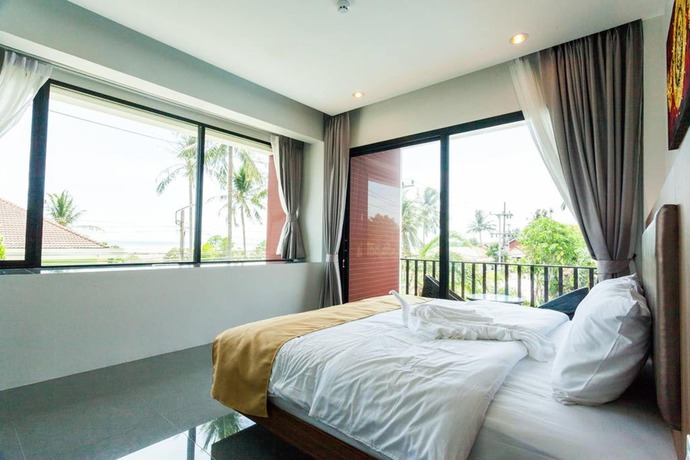 Imagen de la habitación del Hotel Nitchanan Villa. Foto 9