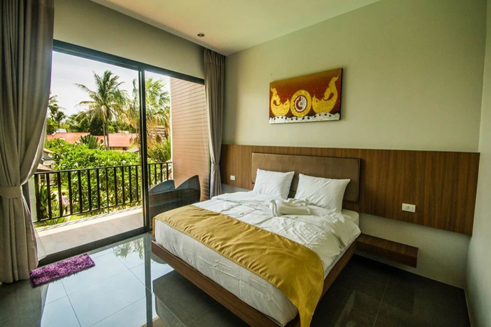 Imagen de la habitación del Hotel Nitchanan Villa. Foto 10