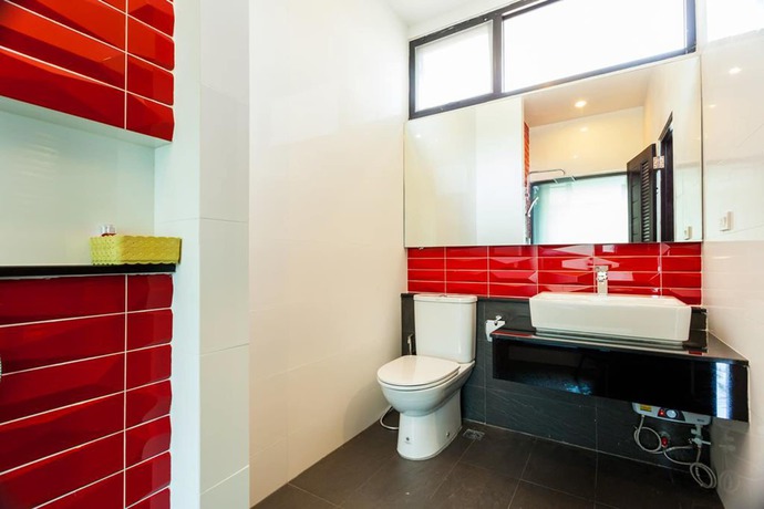 Imagen de la habitación del Hotel Nitchanan Villa. Foto 11