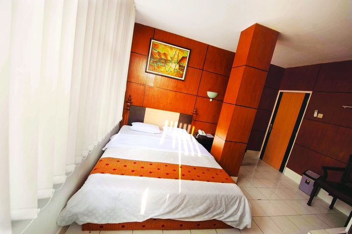 Imagen de la habitación del Hotel Nite And Day Semarang. Foto 5