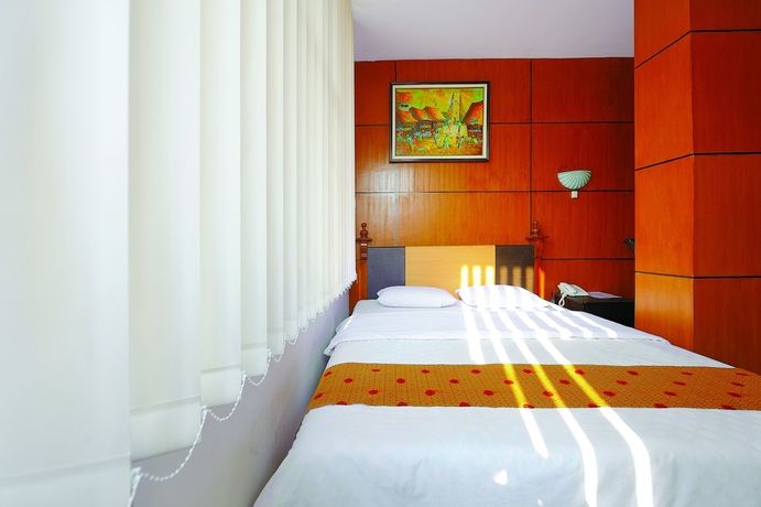 Imagen de la habitación del Hotel Nite And Day Semarang. Foto 6