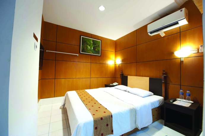 Imagen de la habitación del Hotel Nite And Day Semarang. Foto 14