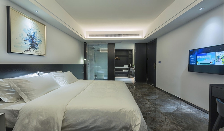 Imagen de la habitación del Hotel Niuguanjia Modern Guest House. Foto 8