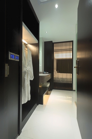 Imagen de la habitación del Hotel Niuguanjia Modern Guest House. Foto 11