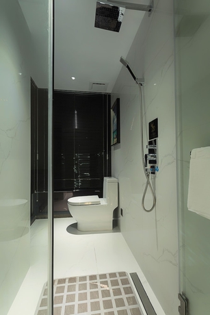 Imagen de la habitación del Hotel Niuguanjia Modern Guest House. Foto 13