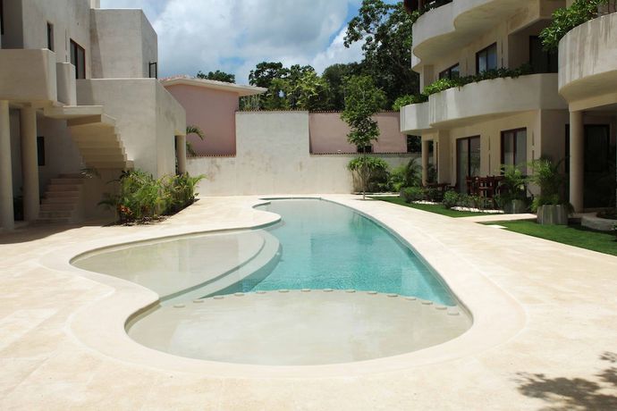 Imagen de la piscina del Hotel Niwa Tulum Luxury Suites. Foto 8