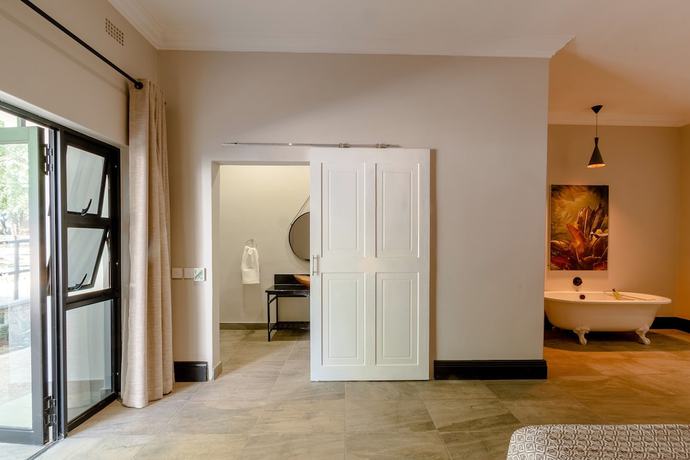 Imagen de la habitación del Hotel Nkosi Guest Lodge. Foto 13
