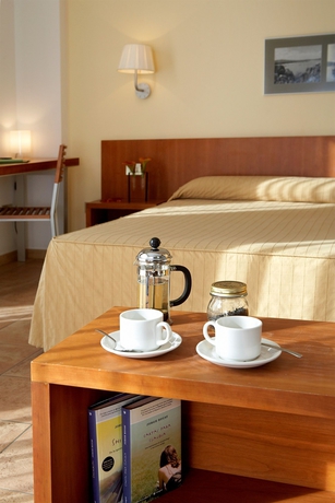 Imagen de la habitación del Hotel Nm Suites. Foto 7