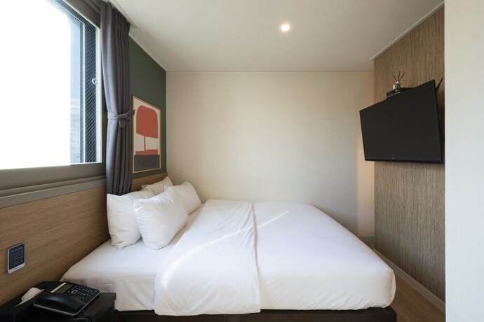 Imagen de la habitación del Hotel No.25 Signature Daechung. Foto 19
