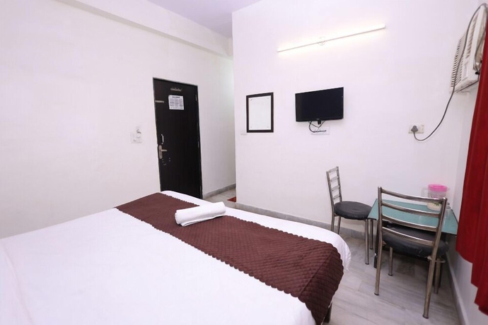 Imagen de la habitación del Hotel NoVo Agra. Foto 9