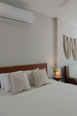 Imagen de la habitación del Hotel Noah Beach and Suites. Foto 11