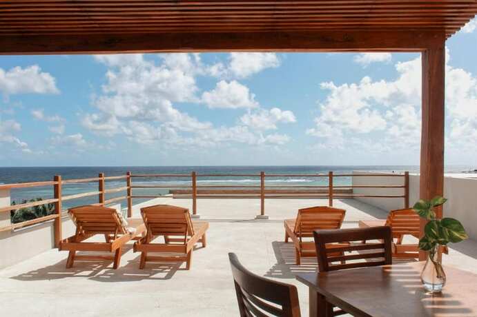 Imagen de la habitación del Hotel Noah Beach and Suites. Foto 15