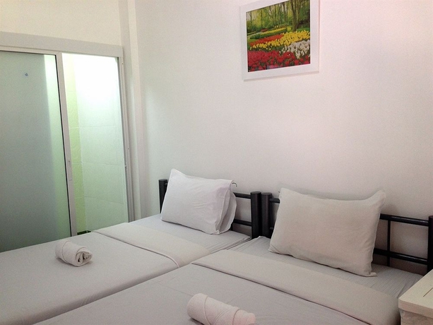 Imagen de la habitación del Hotel Noble Homestay. Foto 9