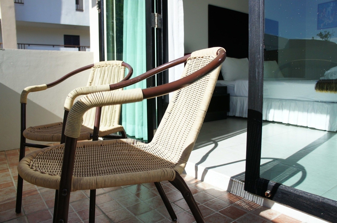 Imagen de la habitación del Hotel Noble House, Phuket. Foto 10