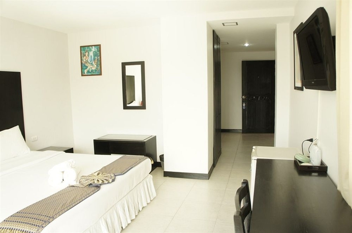 Imagen de la habitación del Hotel Noble House, Phuket. Foto 13