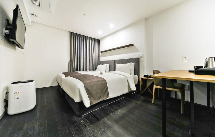 Imagen de la habitación del Hotel Noble Stay. Foto 11