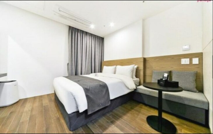 Imagen de la habitación del Hotel Noble Stay. Foto 15