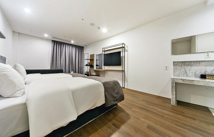 Imagen de la habitación del Hotel Noble Stay. Foto 19