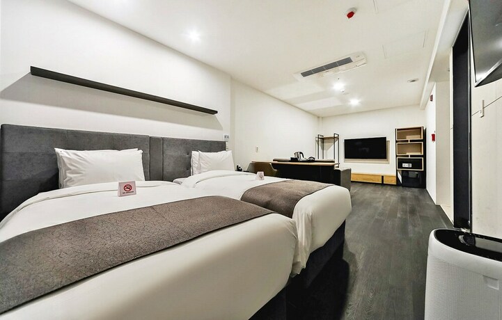 Imagen de la habitación del Hotel Noble Stay. Foto 20