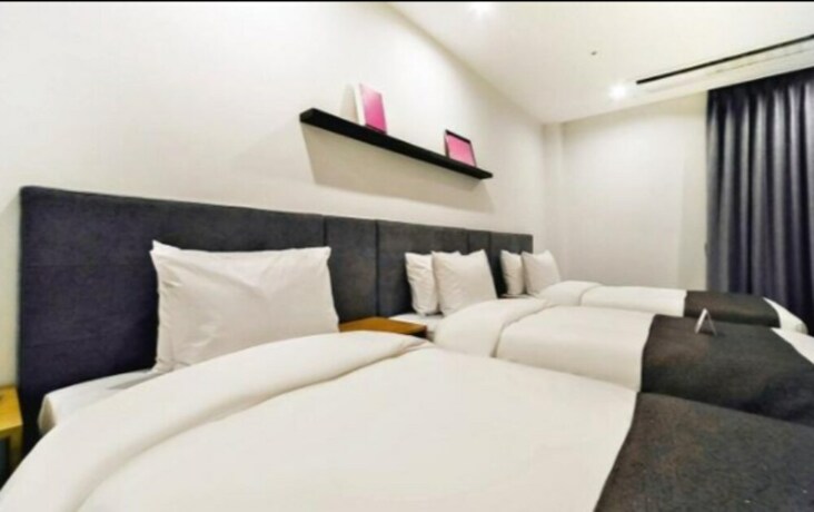 Imagen de la habitación del Hotel Noble Stay. Foto 30