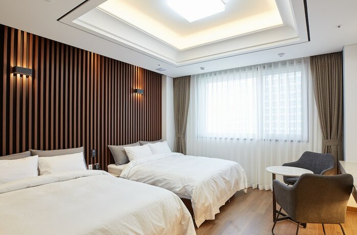 Imagen de la habitación del Hotel Noble Stay. Foto 15