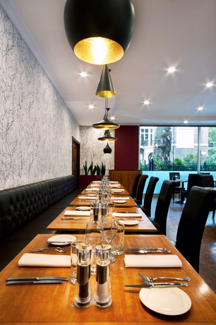 Imagen del bar/restaurante del Hotel Nobu London Portman Square. Foto 2