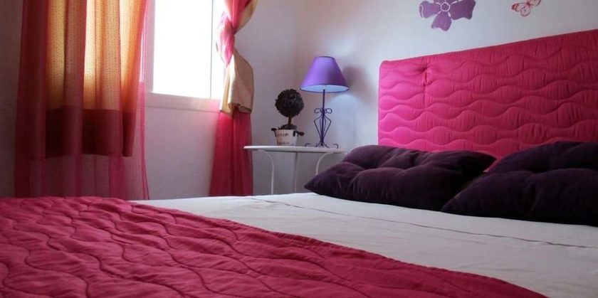 Imagen de la habitación del Hotel Noches En Triana. Foto 10