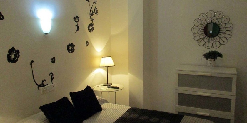 Imagen de la habitación del Hotel Noches En Triana. Foto 11