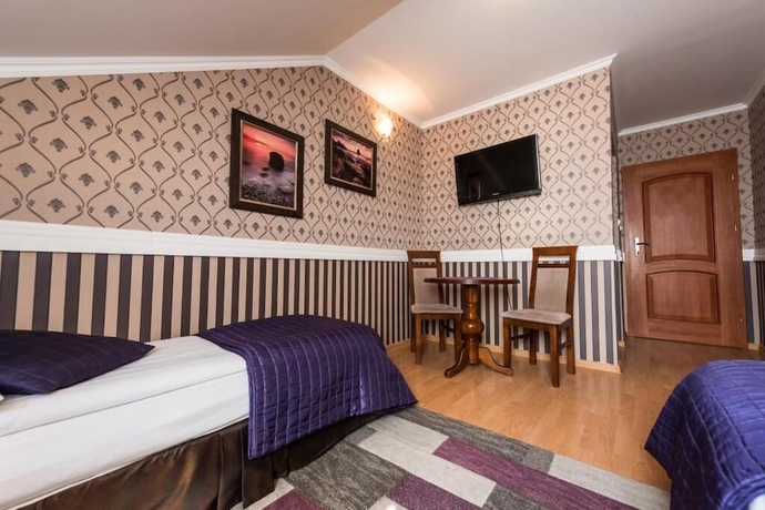 Imagen de la habitación del Hotel Noclegi Komfort. Foto 4