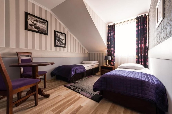 Imagen de la habitación del Hotel Noclegi Komfort. Foto 11