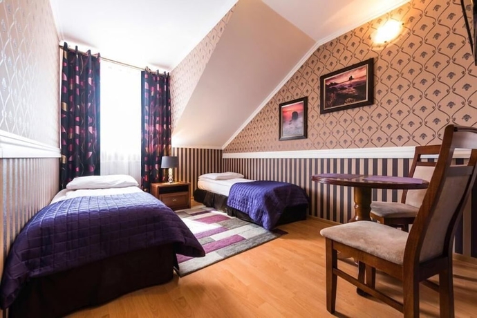 Imagen de la habitación del Hotel Noclegi Komfort. Foto 13