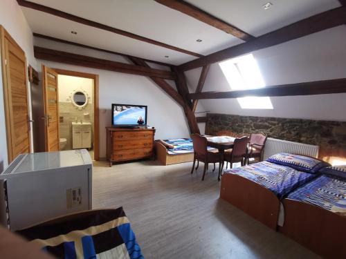 Imagen de la habitación del Hotel Noclegi nad neonet Bogatynia. Foto 13
