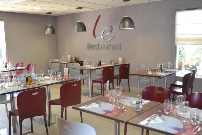 Imagen del bar/restaurante del Hotel Noemys Arles. Foto 4