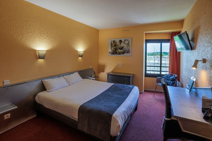 Imagen de la habitación del Hotel Noemys Brive. Foto 16