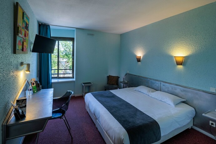 Imagen de la habitación del Hotel Noemys Brive. Foto 18