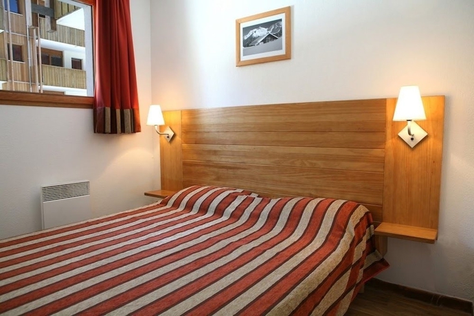 Imagen de la habitación del Hotel Noemys Le Pra Palier. Foto 11