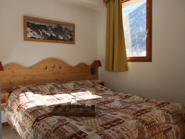 Imagen de la habitación del Hotel Noemys Les Balcons du Viso. Foto 20