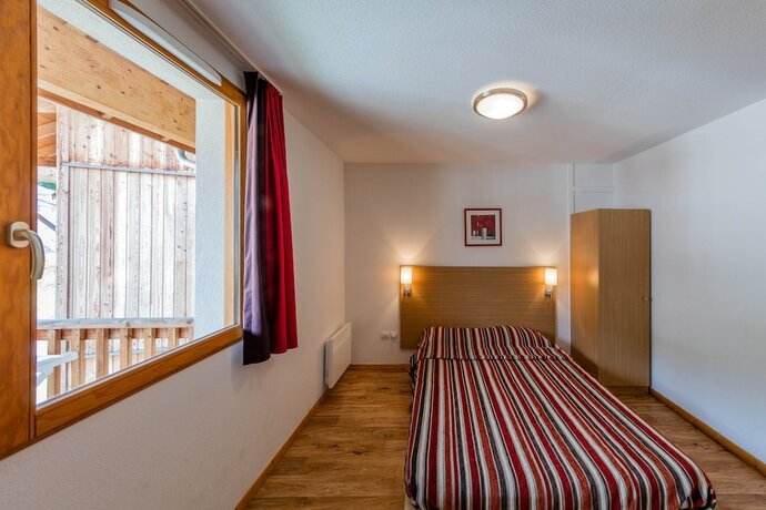 Imagen de la habitación del Hotel Noemys Les Chalets De Bois M&eacute;an. Foto 21