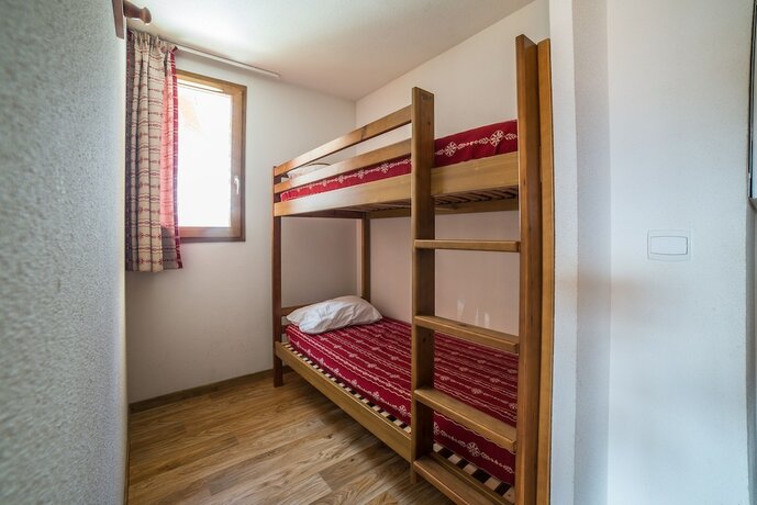 Imagen de la habitación del Hotel Noemys Les Chalets du Hameau des Aiguilles. Foto 13