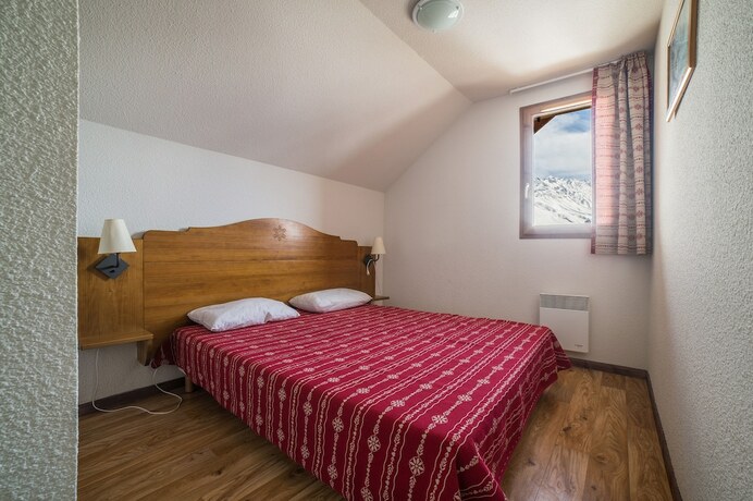 Imagen de la habitación del Hotel Noemys Les Chalets du Hameau des Aiguilles. Foto 16