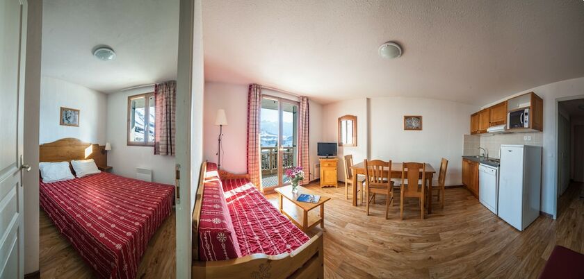 Imagen de la habitación del Hotel Noemys Les Chalets du Hameau des Aiguilles. Foto 17