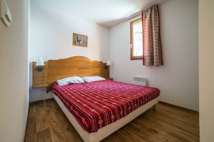 Imagen de la habitación del Hotel Noemys Les Chalets du Hameau des Aiguilles. Foto 18