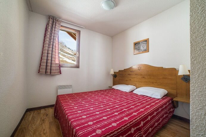 Imagen de la habitación del Hotel Noemys Les Chalets du Hameau des Aiguilles. Foto 20