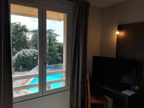 Imagen de la habitación del Hotel Noemys Morgon. Foto 4