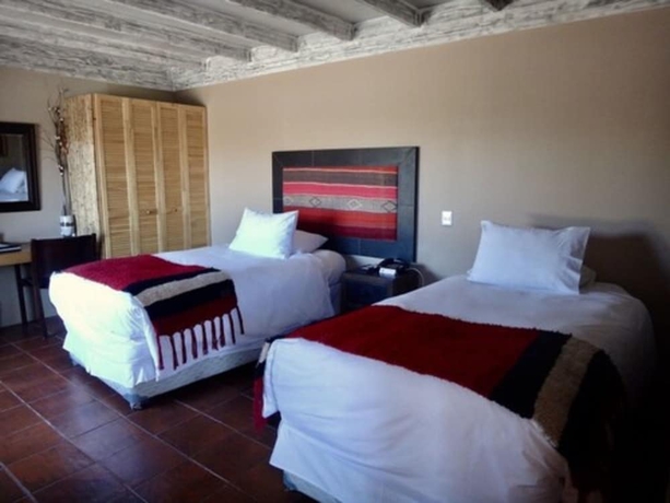 Imagen de la habitación del Hotel Noi Borde Loa. Foto 12