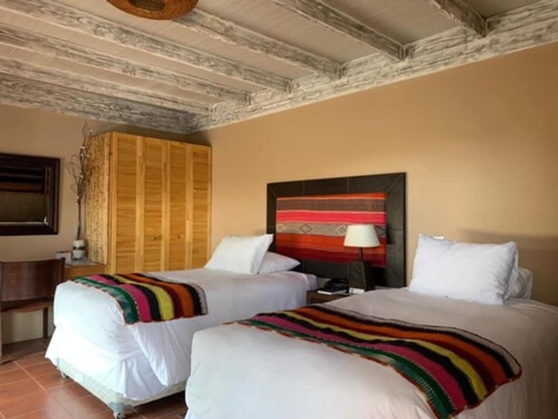 Imagen de la habitación del Hotel Noi Borde Loa. Foto 15