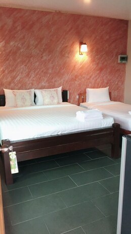 Imagen de la habitación del Hotel Nok Chan Mee Na. Foto 13