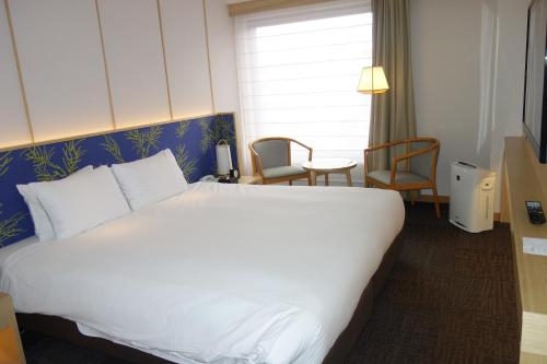 Imagen de la habitación del Hotel Noku Kyoto. Foto 6